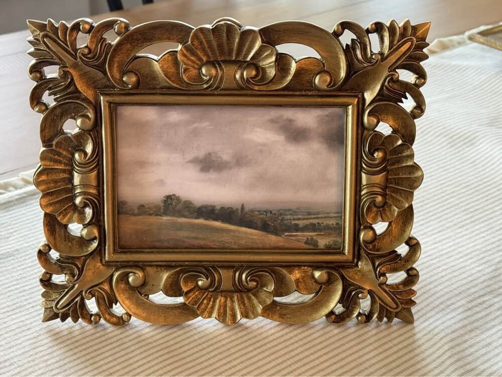 Ornate Gold Picture Frame with Cloudy Landscape Print